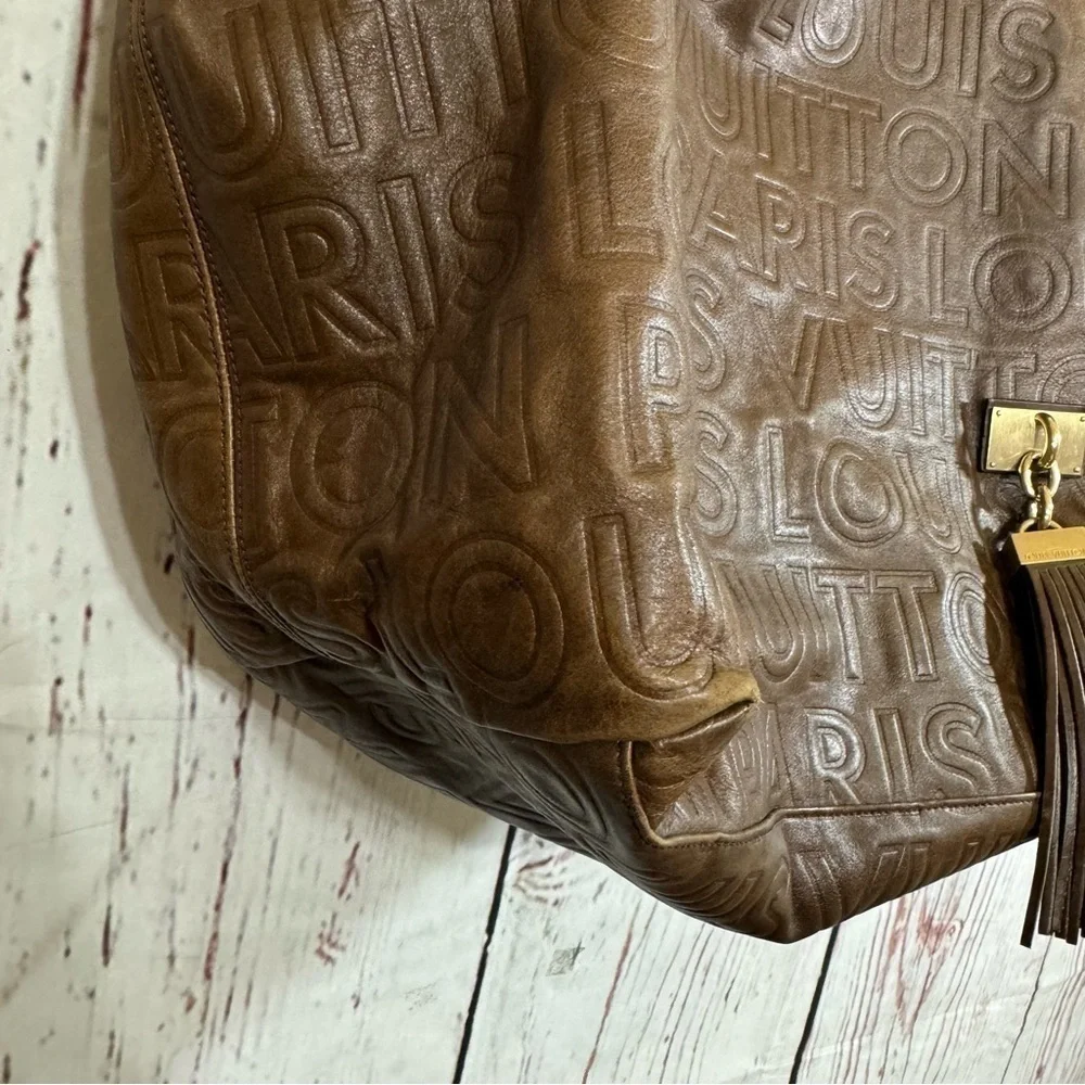 Louis Vuitton Paris Souple Whisper PM Chocolate Embossed leather bag limited